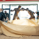 A statue of boxers Joe Frazier, center right, and Muhammad Ali, center left, is unveiled on the 50th anniversary their World Heavyweight Champion fight in Feasterville, Pa., on Monday.